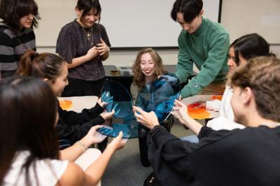 Image of Seaver instructor Rachel Tremaine engaging with students
