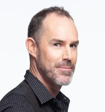 Headshot photo of Justin Trevor Winters